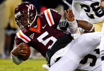 ATLANTA - OCTOBER 17:  Quarterback Tyrod Taylor #5 of the Virginia Tech Hokies rushes upfield against Brad Jefferson #51 of the Georgia Tech Yellow Jackets at Bobby Dodd Stadium on October 17, 2009 in Atlanta, Georgia.  (Photo by Kevin C. Cox/Getty Images)