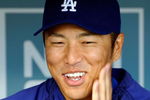 LOS ANGELES, CA - OCTOBER 14:  Startin pitcher Hiroki Kuroda #18 of the Los Angeles Dodgers speaks to reporters after a work out for the NLCS against the Philadelphia Phillies on October 14, 2009 at Dodger Stadium in Los Angeles, California. Kuroda is scheduled to start Game Three.  (Photo by Kevork Djansezian/Getty Images)
