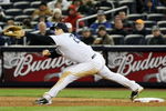 NEW YORK - OCTOBER 16:  Mark Teixeira #25 of the New York Yankees stretches to catch a throw at first base in the sixth inning against the Los Angeles Angels of Anaheim in Game One of the ALCS during the 2009 MLB Playoffs at Yankee Stadium on October 16, 2009 in New York, New York.  (Photo by Al Bello/Getty Images)