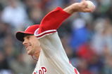 DENVER - OCTOBER 11:  Cliff Lee #34 of the Philadelphia Phillies pitches against the Colorado Rockies in Game Four of the NLDS during the 2009 MLB Playoffs at Coors Field on October 12, 2009 in Denver, Colorado. (Photo by Jed Jacobsohn/Getty Images)