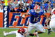 GAINESVILLE, FL - OCTOBER 17: Quarterback Tim Tebow #15 of the Florida Gators rushes upfield against the University of Arkansas Razorbacks October 17, 2009 at Ben Hill Griffin Stadium in Gainesville, Florida.  (Photo by Al Messerschmidt/Getty Images)