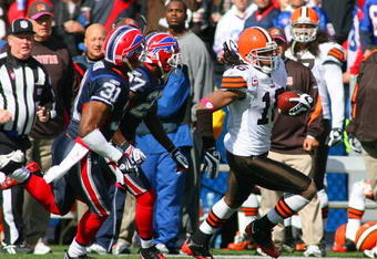 ORCHARD PARK, NY - OCTOBER 11: Joshua Cribbs #16 of the Cleveland Browns runs ahead of Reggie Corner #27 and Jairus Byrd #31 of the Buffalo Bills against at Ralph Wilson Stadium on October 11, 2009 in Orchard Park, New York. The Browns defeated the Bills 6-3. (Photo by Rick Stewart/Getty Images)