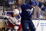 TORONTO - OCTOBER 17:  Mike Komisarek #8 of the Toronto Maple Leafs runs into Vaclav Prospal #20 of the New York Rangers during a NHL game at the Air Canada Centre on October 17, 2009 in Toronto, Ontario, Canada .  (Photo by Abelimages/Getty Images)