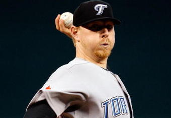 KANSAS CITY, MO - APRIL 27:  Starting pitcher David Purcey #25 of the Toronto Blue Jays warms up before a game against the Kansas City Royals at Kauffman Stadium on April 27, 2009 in Kansas City, Missouri.  (Photo by Jamie Squire/Getty Images)