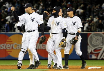 NEW YORK - OCTOBER 16:  The New York Yankees celebrate their 4-1 victory over the Los Angeles Angels of Anaheim in Game One of the ALCS during the 2009 MLB Playoffs at Yankee Stadium on October 16, 2009 in New York, New York. (Photo by Jim McIsaac/Getty Images)