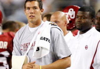 ARLINGTON, TX - SEPTEMBER 05:  Quarterback Sam Bradford #14 of the Oklahoma Sooners stands on the sidelines after suffering an injury against the Brigham Young Cougars at Cowboys Stadium on September 5, 2009 in Arlington, Texas.  (Photo by Ronald Martinez/Getty Images)