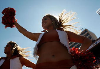 DALLAS - OCTOBER 17:  A Texas Longhorns cheerleader performs during a game against the Oklahoma Sooners at Cotton Bowl on October 17, 2009 in Dallas, Texas.  (Photo by Ronald Martinez/Getty Images)