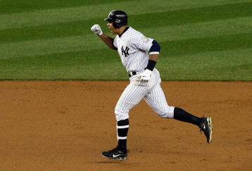 NEW YORK - OCTOBER 17: Alex Rodriguez #13 of New York Yankees celebrates his solo home run to tie the game against the the Los Angeles Angels of Anaheim in the bottom of the eleventh inninng of Game Two of the ALCS during the 2009 MLB Playoffs at Yankee Stadium on October 17, 2009 in the Bronx borough of New York City. (Photo by Jim McIsaac/Getty Images) 