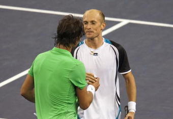 SHANGHAI, CHINA - OCTOBER 18:  Nikolay Davydenko of Russia shakes hand with Rafael Nadal of Spain after winning the final on day eight of 2009 Shanghai ATP Masters 1000 at Qi Zhong Tennis Centre on October 18, 2009 in Shanghai China.  (Photo by Victor Fraile/Getty Images)