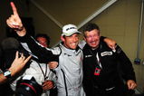 SAO PAULO, BRAZIL - OCTOBER 18:  Jenson Button (L) of Great Britain and Brawn GP is congratulated by Team Principal Ross Brawn (R) after clinching the F1 World Drivers Championship during the Brazilian Formula One Grand Prix at the Interlagos Circuit on October 18, 2009 in Sao Paulo, Brazil.  (Photo by Clive Mason/Getty Images)
