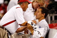 ARLINGTON, TX - SEPTEMBER 05:  Quarterback Sam Bradford #14 of the Oklahoma Sooners on the sidelines after suffering an injury against the Brigham Young Cougars at Cowboys Stadium on September 5, 2009 in Arlington, Texas.  (Photo by Ronald Martinez/Getty Images)