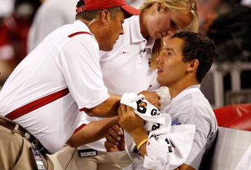 ARLINGTON, TX - SEPTEMBER 05:  Quarterback Sam Bradford #14 of the Oklahoma Sooners on the sidelines after suffering an injury against the Brigham Young Cougars at Cowboys Stadium on September 5, 2009 in Arlington, Texas.  (Photo by Ronald Martinez/Getty Images)