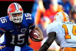 GAINESVILLE, FL - SEPTEMBER 19:  Tim Tebow #15 of the Florida Gators is cornered by Eric Berry #14 of the Tennessee Volunteers during the game at Ben Hill Griffin Stadium on September 19, 2009 in Gainesville, Florida.  (Photo by Sam Greenwood/Getty Images)