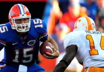 GAINESVILLE, FL - SEPTEMBER 19:  Tim Tebow #15 of the Florida Gators is cornered by Eric Berry #14 of the Tennessee Volunteers during the game at Ben Hill Griffin Stadium on September 19, 2009 in Gainesville, Florida.  (Photo by Sam Greenwood/Getty Images)