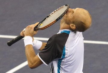 SHANGHAI, CHINA - OCTOBER 18:  Nikolay Davydenko of Russia celebrates match point to Rafael Nadal of Spain during final match on day eight of 2009 Shanghai ATP Masters 1000 at Qi Zhong Tennis Centre on October 18, 2009 in Shanghai China.  (Photo by Victor Fraile/Getty Images)
