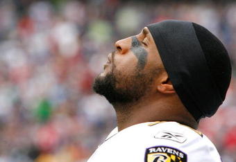 FOXBORO, MA - OCTOBER 4:  Ray Lewis  #52 of the Baltimore takes breather before a game against the New England Patriots at Gillette Stadium on October 4, 2009 in Foxboro, Massachusetts. (Photo by Jim Rogash/Getty Images)
