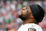 FOXBORO, MA - OCTOBER 4:  Ray Lewis  #52 of the Baltimore takes breather before a game against the New England Patriots at Gillette Stadium on October 4, 2009 in Foxboro, Massachusetts. (Photo by Jim Rogash/Getty Images)