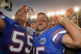 GAINESVILLE, FL - OCTOBER 17: Quarterback Tim Tebow #15  and lineman Mike Pouncey #55 of the Florida Gators celebrate a win against the University of Arkansas Razorbacks October 17, 2009 at Ben Hill Griffin Stadium in Gainesville, Florida.  (Photo by Al Messerschmidt/Getty Images)