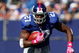 EAST RUTHERFORD, NJ - OCTOBER 11: Brandon Jacobs #27 of the New York Giants runs against the Oakland Raiders during the game on October 11, 2009 at Giants Stadium in East Rutherford, New Jersey. (Photo by Jared Wickerham/Getty Images)