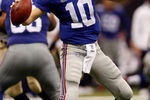 NEW ORLEANS - OCTOBER 18:  Eli Manning #10 of the New York Giants throws a pass against the New Orleans Saints at the Louisiana Superdome on October 18, 2009 in New Orleans, Louisiana. The Saints defeated the Giants 48-27.   (Photo by Chris Graythen/Getty Images)