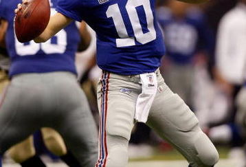 NEW ORLEANS - OCTOBER 18:  Eli Manning #10 of the New York Giants throws a pass against the New Orleans Saints at the Louisiana Superdome on October 18, 2009 in New Orleans, Louisiana. The Saints defeated the Giants 48-27.   (Photo by Chris Graythen/Getty Images)