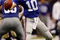 NEW ORLEANS - OCTOBER 18:  Eli Manning #10 of the New York Giants throws a pass against the New Orleans Saints at the Louisiana Superdome on October 18, 2009 in New Orleans, Louisiana. The Saints defeated the Giants 48-27.   (Photo by Chris Graythen/Getty Images)