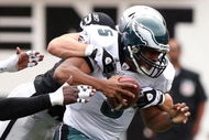 OAKLAND, CA - OCTOBER 18:   Donovan McNabb #5 of the Philadelphia Eagles is sacked by Trevor Soctt #91 of the Oakland Raiders during an NFL game at the Oakland-Alameda County Coliseum on October 18, 2009 in Oakland, California.  (Photo by Jed Jacobsohn/Getty Images)