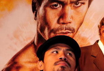BEVERLY HILLS, CA - SEPTEMBER 14: Manny Pacquiao listens as other speakers speak during the press conference at the Beverly Hills Hotel on September 14, 2009 in Beverly Hills, California.  (Photo by Jacob de Golish/Getty Images)
