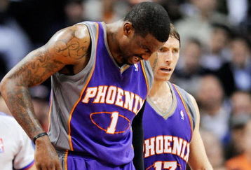 LOS ANGELES, CA - FEBRUARY 18:  Amar'e Stoudamire #1 of the Phoenix Suns is comforted by teammate Steve Nash #13 after a collision with Al Thornton #12 of the Los Angeles Clippers during the first half action against at the Staples Center February 18, 2009, in Los Angeles, California. The Suns have announced that Amare Stoudemire was forced to undergo surgery Friday to repair a partially detached retina in his right eye suffered in a Wednesday night rout of the Los Angeles Clippers. It is Stoudemire's second injury in that eye since October and threatens to sideline the All-Star forward for the rest of the regular season.NOTE TO USER: User expressly acknowledges and agrees that, by downloading and or using this photograph, User is consenting to the terms and conditions of the Getty Images License Agreement.  (Photo by Kevork Djansezian/Getty Images)