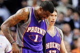 LOS ANGELES, CA - FEBRUARY 18:  Amar'e Stoudamire #1 of the Phoenix Suns is comforted by teammate Steve Nash #13 after a collision with Al Thornton #12 of the Los Angeles Clippers during the first half action against at the Staples Center February 18, 2009, in Los Angeles, California. The Suns have announced that Amare Stoudemire was forced to undergo surgery Friday to repair a partially detached retina in his right eye suffered in a Wednesday night rout of the Los Angeles Clippers. It is Stoudemire's second injury in that eye since October and threatens to sideline the All-Star forward for the rest of the regular season.NOTE TO USER: User expressly acknowledges and agrees that, by downloading and or using this photograph, User is consenting to the terms and conditions of the Getty Images License Agreement.  (Photo by Kevork Djansezian/Getty Images)