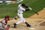 NEW YORK - OCTOBER 17:  Derek Jeter #2 of the New York Yankees connects for a third inning home run against the Los Angeles Angels of Anaheim in Game Two of the ALCS during the 2009 MLB Playoffs on October 17, 2009 at Yankee Stadium in the Bronx borough of New York City.  (Photo by Jim McIsaac/Getty Images)