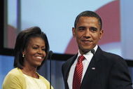 COPENHAGEN, DENMARK - OCTOBER 2: U.S. President Barack Obama is introduced by first lady Michelle Obama before he makes a presentation in support of Chicago as the host city for the 2016 Summer Olympic Games on October 2, 2009 in Copenhagen, Denmark. The 121st session of the International Olympic Committee (IOC) will vote on October 2 on whether Chicago, Tokyo, Rio de Janeiro or Madrid will host the 2016 Olympic Games. (Photo by Charles Dharapak-Pool/Getty Images)