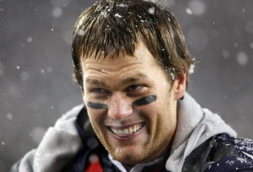 FOXBORO, MA - OCTOBER 18:  Tom Brady #12 of the New England Patriots stands on the sideline in the fourth quarter against the Tennessee Titans on October 18, 2009 at Gillette Stadium in Foxboro, Massachusetts. The Patriots defeated the Titans 59-0.  (Photo by Elsa/Getty Images)