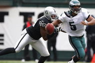 OAKLAND, CA - OCTOBER 18: Donovan McNabb #5 of the Philadelphia Eagles is sacked by Jay Richardson #98 of the Oakland Raiders during an NFL game at the Oakland-Alameda County Coliseum on October 18, 2009 in Oakland, California. (Photo by Jed Jacobsohn/Getty Images)
