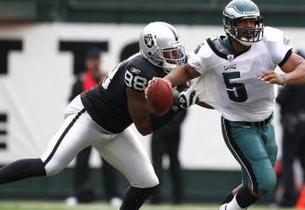 OAKLAND, CA - OCTOBER 18:  Donovan McNabb #5 of the Philadelphia Eagles is sacked by Jay Richardson #98 of the Oakland Raiders during an NFL game at the Oakland-Alameda County Coliseum on October 18, 2009 in Oakland, California.  (Photo by Jed Jacobsohn/Getty Images)