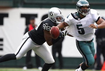 OAKLAND, CA - OCTOBER 18:  Donovan McNabb #5 of the Philadelphia Eagles is sacked by Jay Richardson #98 of the Oakland Raiders during an NFL game at the Oakland-Alameda County Coliseum on October 18, 2009 in Oakland, California.  (Photo by Jed Jacobsohn/Getty Images)