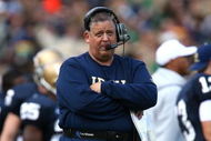 SOUTH BEND, IN - OCTOBER 03: Head coach Charlie Weis of the Notre Dame Fighting Irish watches as his team takes on the Washington Huskies on October 3, 2009 at Notre Dame Stadium in South Bend, Indiana.  Notre Dame defeated Washington 37-30 in overtime.  (Photo by Jonathan Daniel/Getty Images)