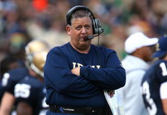 SOUTH BEND, IN - OCTOBER 03: Head coach Charlie Weis of the Notre Dame Fighting Irish watches as his team takes on the Washington Huskies on October 3, 2009 at Notre Dame Stadium in South Bend, Indiana.  Notre Dame defeated Washington 37-30 in overtime.  (Photo by Jonathan Daniel/Getty Images)