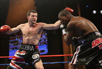 MASHANTUCKET, CT - APRIL 25:  Carl Froch lands a left on Jermain Taylor during their WBC Super Middleweight Championship bout at the MGM Grand at Foxwoods on April 25, 2009 in Mashantucket, Connecticut.  (Photo by Nick Laham/Getty Images)