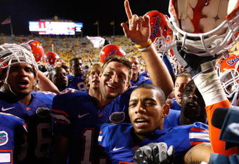 BATON ROUGE, LA - OCTOBER 10:  Quarterback Tim Tebow #15 of the Florida Gators celebrates their 13-3 win over the Louisiana State University Tigers with his teammates at Tiger Stadium on October 10, 2009 in Baton Rouge, Louisiana.  (Photo by Kevin C. Cox/Getty Images)