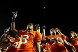 FORT LAUDERDALE, FL - OCTOBER 03: Wide receiver Travis Benjamin #3 and linebacker Darryl Sharpton #50 of the Miami Hurricanes celebrate after defeating the Oklahoma Sooners at Land Shark Stadium on October 3, 2009 in Fort Lauderdale, Florida. Miami defeated Oklahoma 21-20. (Photo by Doug Benc/Getty Images)