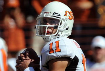 AUSTIN, TX - OCTOBER 25:  Quarterback Zac Robinson #11 of the Oklahoma State Cowboys drops back to pass against the Texas Longhorns at Texas Memorial Stadium on October 25, 2008 in Austin, Texas.  (Photo by Ronald Martinez/Getty Images)