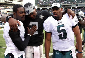 OAKLAND, CA - OCTOBER 18:  Donovan McNabb #5 of the Philadelphia Eagles talks with teammate Michael Vick #7 and JaMarcus Russell #2 of the Oakland Raiders at the end of an NFL game at the Oakland-Alameda County Coliseum on October 18, 2009 in Oakland, California.  (Photo by Jed Jacobsohn/Getty Images)