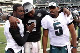 OAKLAND, CA - OCTOBER 18:  Donovan McNabb #5 of the Philadelphia Eagles talks with teammate Michael Vick #7 and JaMarcus Russell #2 of the Oakland Raiders at the end of an NFL game at the Oakland-Alameda County Coliseum on October 18, 2009 in Oakland, California.  (Photo by Jed Jacobsohn/Getty Images)