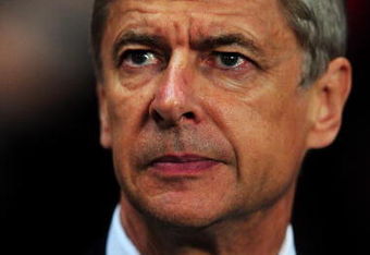 LONDON, ENGLAND - SEPTEMBER 29: Arsenal manager Arsene Wenger looks on before the UEFA Champions League Group H match between Arsenal and Olympiakos at the Emirates Stadium on September 29, 2009 in London, England.  (Photo by Mike Hewitt/Getty Images)