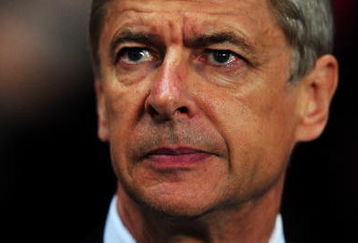 LONDON, ENGLAND - SEPTEMBER 29: Arsenal manager Arsene Wenger looks on before the UEFA Champions League Group H match between Arsenal and Olympiakos at the Emirates Stadium on September 29, 2009 in London, England.  (Photo by Mike Hewitt/Getty Images)