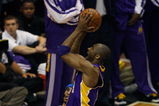 ORLANDO, FL - JUNE 14:  Kobe Bryant #24 of the Los Angeles Lakers goes up for a shot over Courtney Lee #11 of the Orlando Magic in Game Five of the 2009 NBA Finals on June 14, 2009 at Amway Arena in Orlando, Florida.  The Lakers won 99-86.  NOTE TO USER:  User expressly acknowledges and agrees that, by downloading and or using this photograph, User is consenting to the terms and conditions of the Getty Images License Agreement.  (Photo by Chris Graythen/Getty Images)