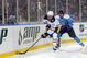 ORCHARD PARK, NY - JANUARY 01: Colby Armstrong #20 of the Pittsburgh Penguins challenges Maxim Afinegenov #61 of the Buffalo Sabres during the NHL Winter Classic at the Ralph Wilson Stadium on January 1, 2008 in Orchard Park, New York. The Penguins won the game 2-1 in a shoot out. (Photo by Dave Sandford/Getty Images)
