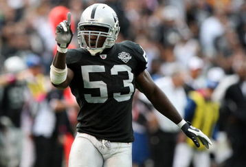 OAKLAND, CA - OCTOBER 18:  Thomas Howard #53 of the Oakland Raiders celebrates after a play against the Philadelphia Eagles during an NFL game at the Oakland-Alameda County Coliseum on October 18, 2009 in Oakland, California.  (Photo by Jed Jacobsohn/Getty Images)