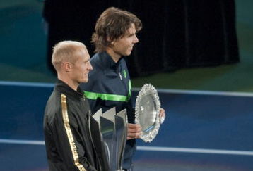 SHANGHAI, CHINA - OCTOBER 18:  Nikolay Davydenko of Russia and Rafael Nadal of Spain pose for photographers after the final on day eight of 2009 Shanghai ATP Masters 1000 at Qi Zhong Tennis Centre on October 18, 2009 in Shanghai China.  (Photo by Victor Fraile/Getty Images)